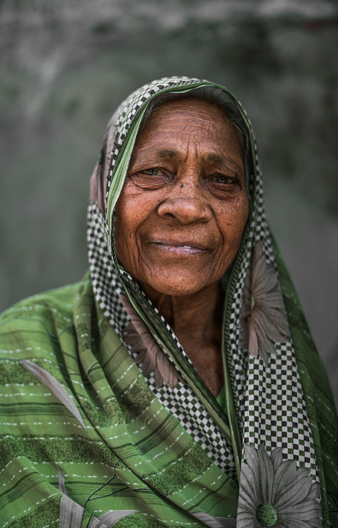 Portrait of an older Czech woman client smiling